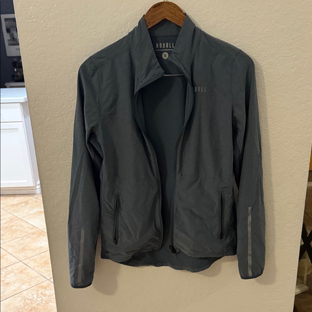 NOBULL women’s  Slate Gray Lightweight Jacket with Reflective Accents